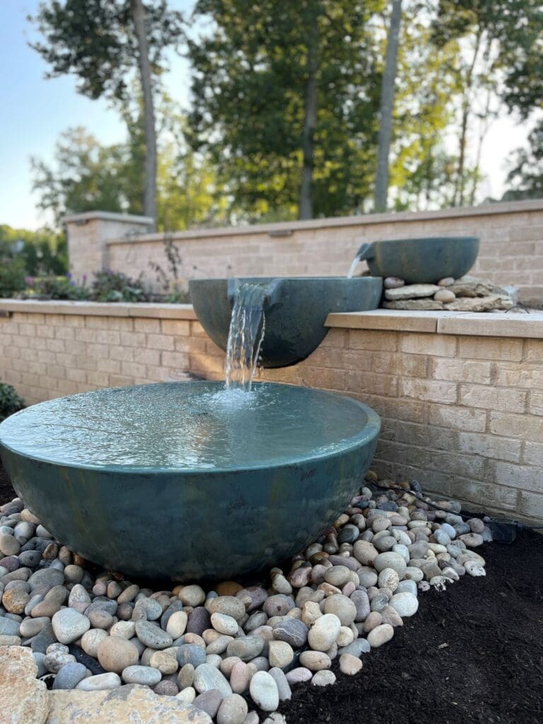 Two spillway bowl fountains