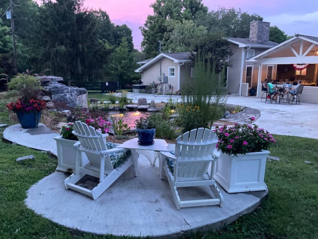 Medium recreational swim pond with seating area